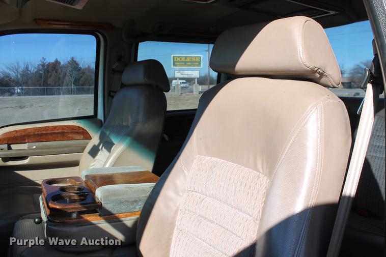 image for item DB5095 1999 Ford F450 Super Duty XLT Crew Cab flatbed truck