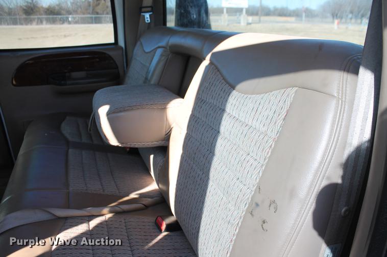 image for item DB5095 1999 Ford F450 Super Duty XLT Crew Cab flatbed truck