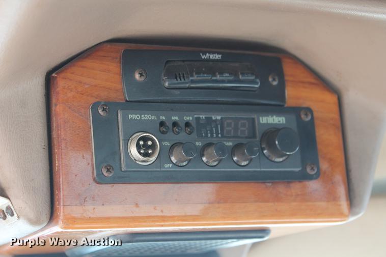 image for item DB5095 1999 Ford F450 Super Duty XLT Crew Cab flatbed truck