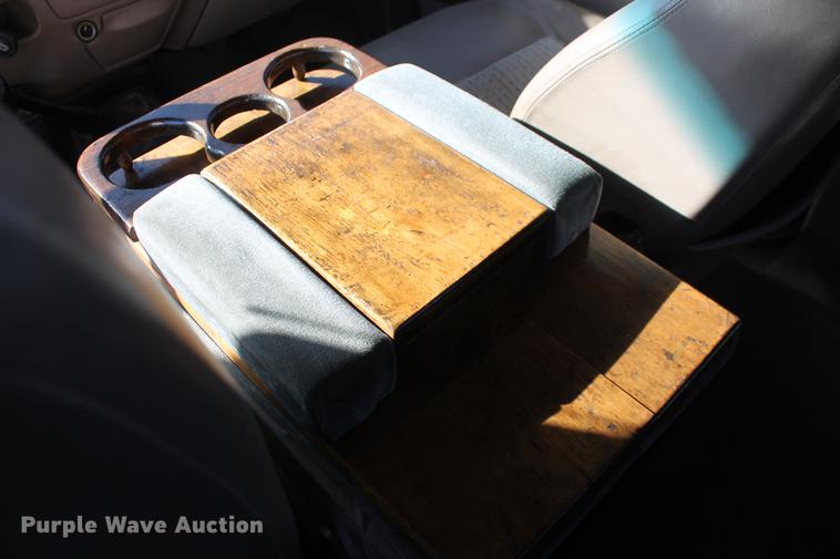 image for item DB5095 1999 Ford F450 Super Duty XLT Crew Cab flatbed truck