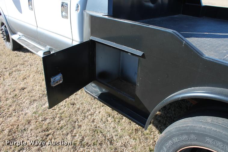image for item DB5095 1999 Ford F450 Super Duty XLT Crew Cab flatbed truck