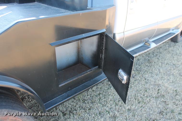 image for item DB5095 1999 Ford F450 Super Duty XLT Crew Cab flatbed truck