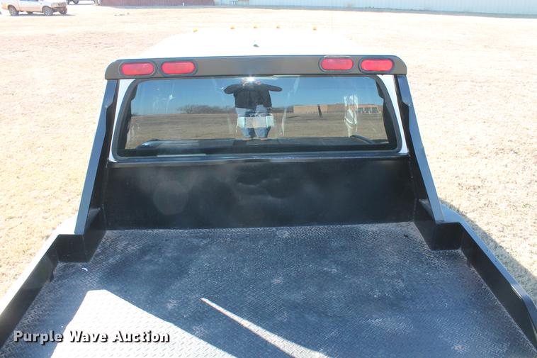 image for item DB5095 1999 Ford F450 Super Duty XLT Crew Cab flatbed truck