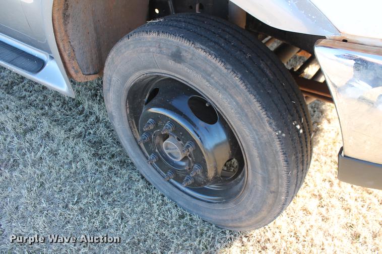 image for item DB5095 1999 Ford F450 Super Duty XLT Crew Cab flatbed truck