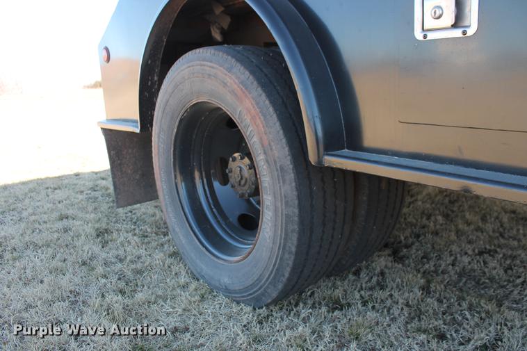 image for item DB5095 1999 Ford F450 Super Duty XLT Crew Cab flatbed truck