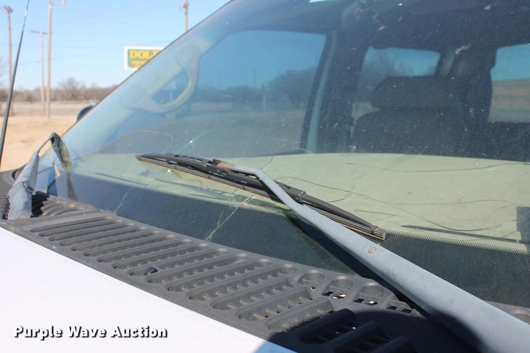 image for item DB5095 1999 Ford F450 Super Duty XLT Crew Cab flatbed truck