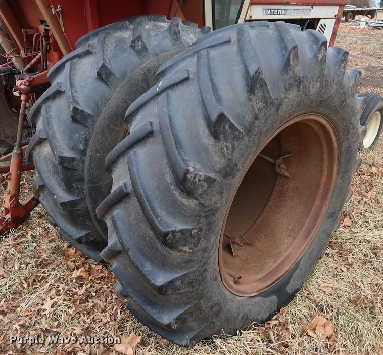 image for item DD5448 (2) International 18.4-34 dual tires and wheels