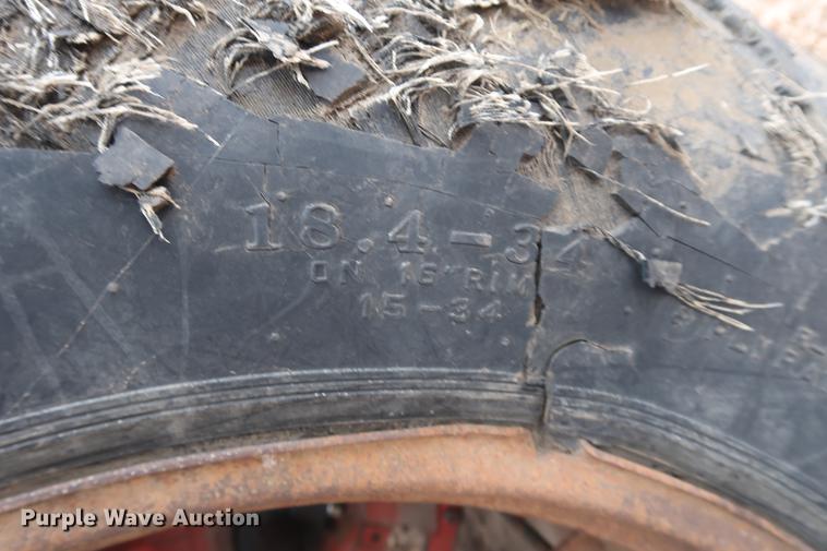 image for item DD5448 (2) International 18.4-34 dual tires and wheels