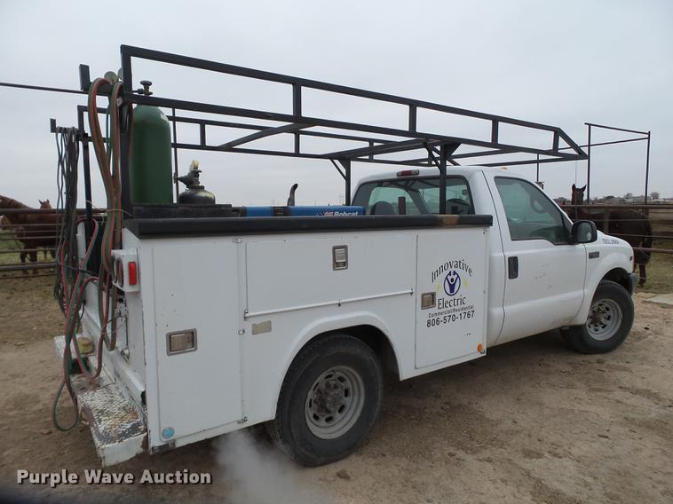 image for item EI9531 2000 Ford F250 Super Duty utility bed pickup truck