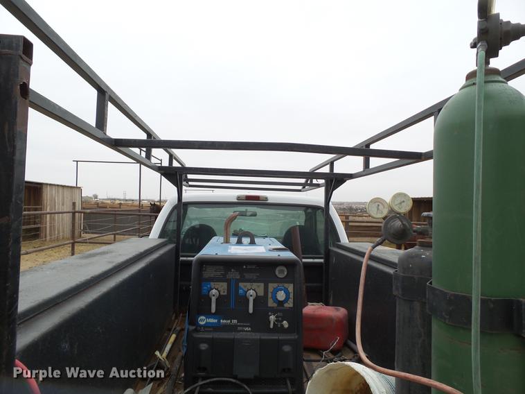 image for item EI9531 2000 Ford F250 Super Duty utility bed pickup truck