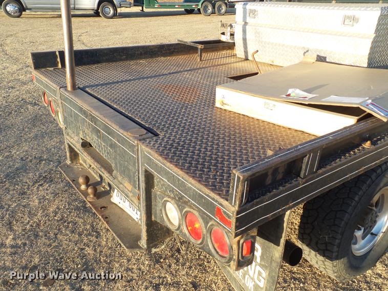 image for item EI9541 2004 Ford F250 Super Duty SuperCab bale bed pickup truck