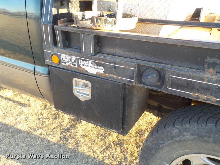 image for item EI9541 2004 Ford F250 Super Duty SuperCab bale bed pickup truck