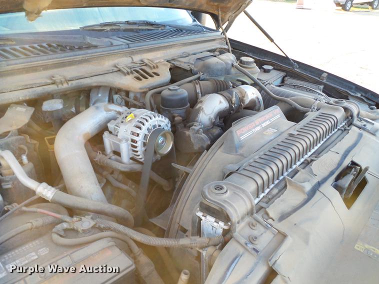 image for item EI9541 2004 Ford F250 Super Duty SuperCab bale bed pickup truck