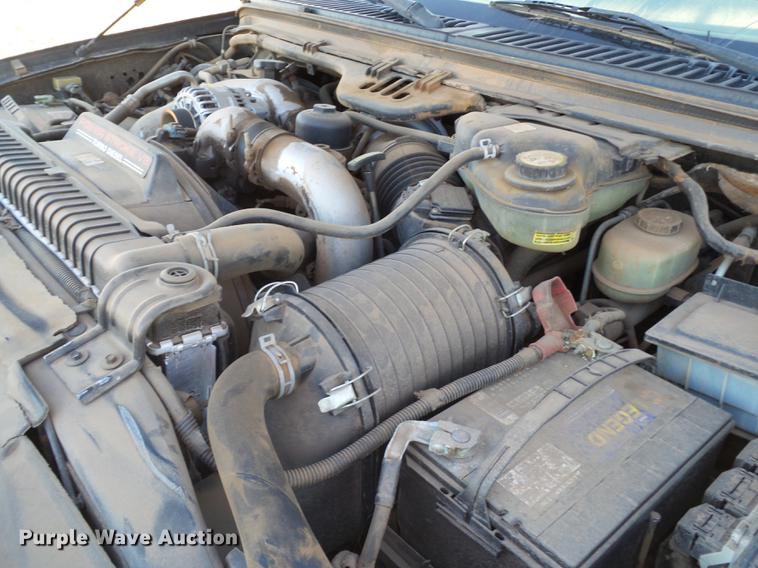 image for item EI9541 2004 Ford F250 Super Duty SuperCab bale bed pickup truck