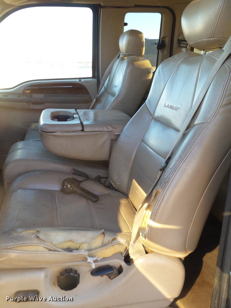 image for item EI9541 2004 Ford F250 Super Duty SuperCab bale bed pickup truck