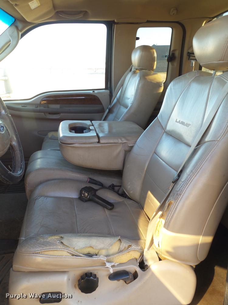 image for item EI9541 2004 Ford F250 Super Duty SuperCab bale bed pickup truck