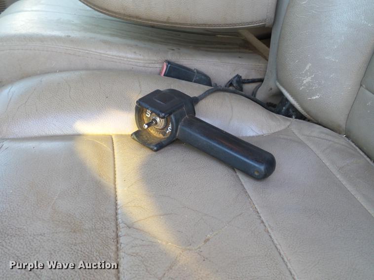 image for item EI9541 2004 Ford F250 Super Duty SuperCab bale bed pickup truck