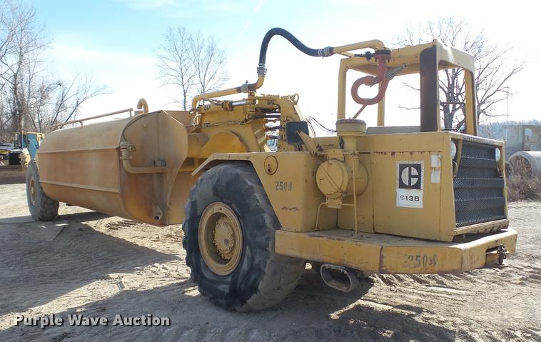 image for item DC5690 1983 Caterpillar 613B water wagon