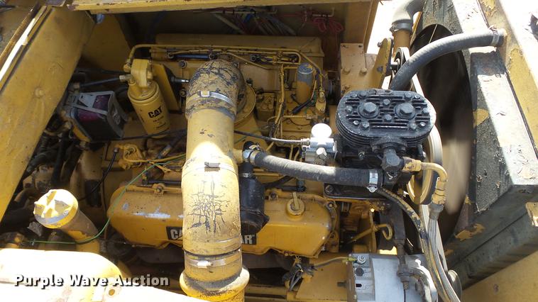 image for item DC5690 1983 Caterpillar 613B water wagon