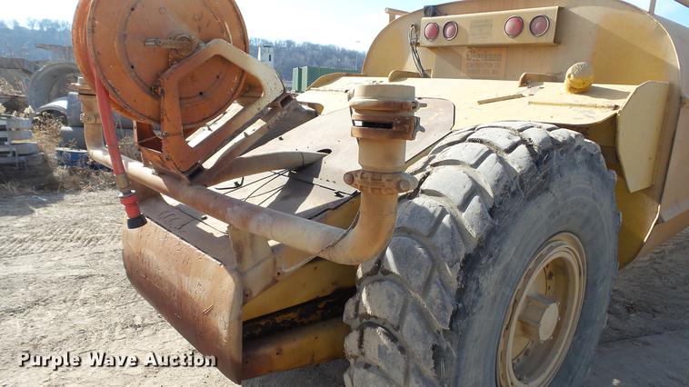 image for item DC5690 1983 Caterpillar 613B water wagon