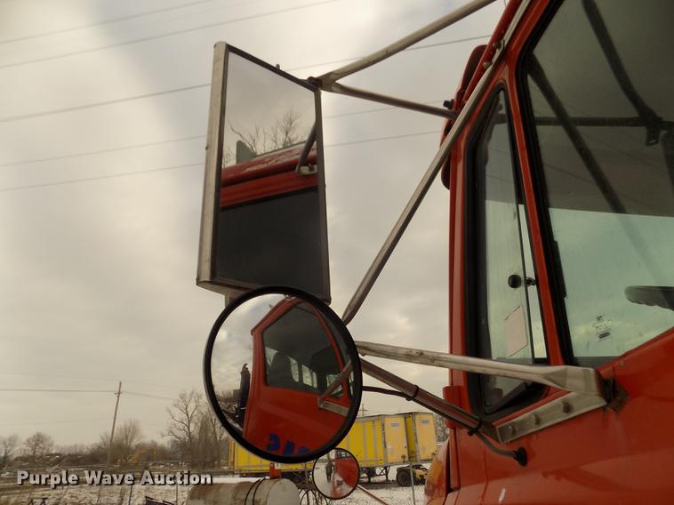 image for item DD2900 2004 Freightliner FL80 roll off container truck