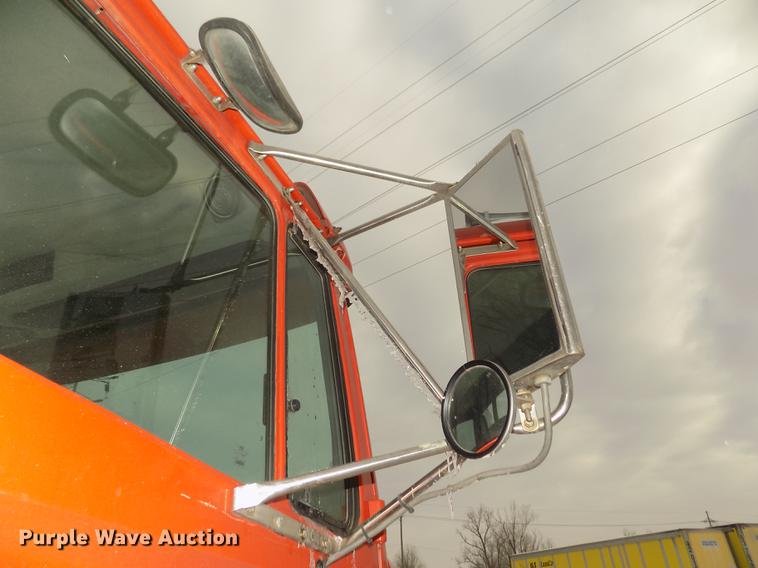 image for item DD2900 2004 Freightliner FL80 roll off container truck