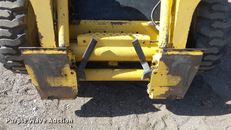 image for item EH9019 2000 John Deere 250 skid steer