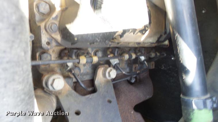 image for item EH9019 2000 John Deere 250 skid steer