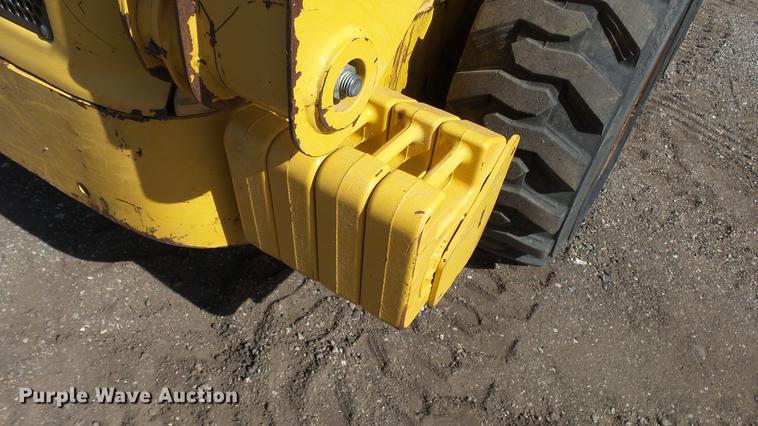 image for item EH9019 2000 John Deere 250 skid steer