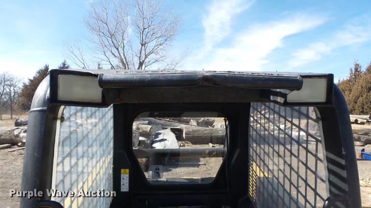 image for item EH9019 2000 John Deere 250 skid steer