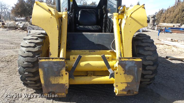 image for item EH9019 2000 John Deere 250 skid steer