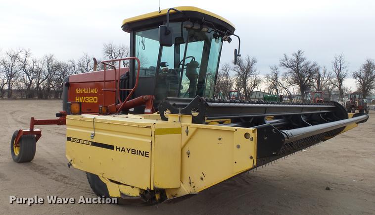 image for item DC0639 2002 New Holland HW320 Haybine self-propelled windrower