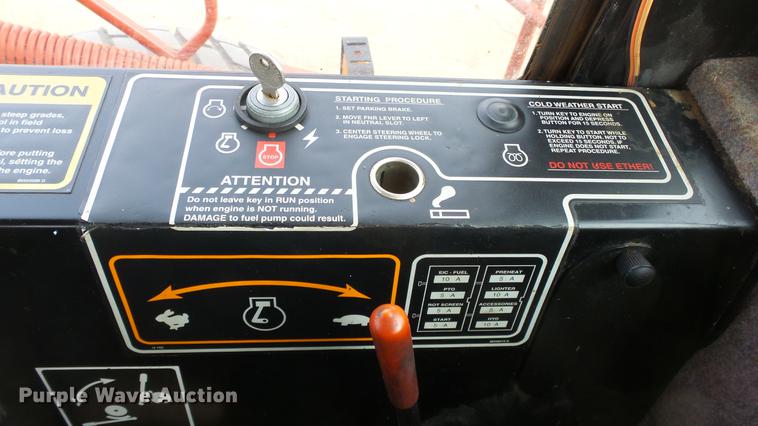 image for item DC0639 2002 New Holland HW320 Haybine self-propelled windrower