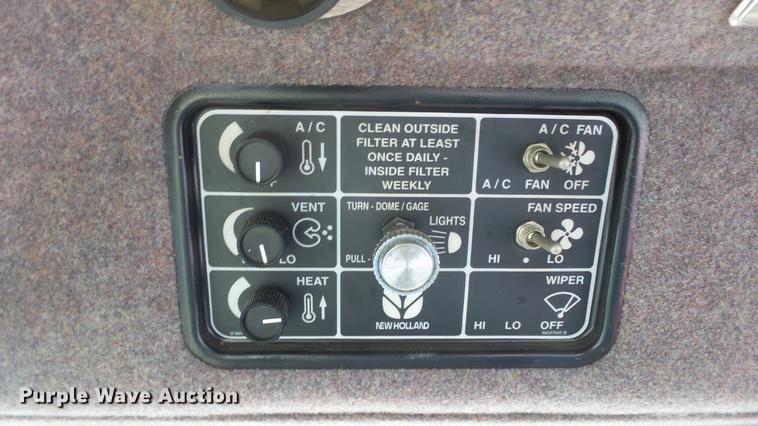 image for item DC0639 2002 New Holland HW320 Haybine self-propelled windrower