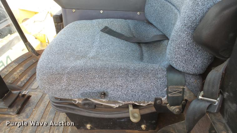 image for item DC0639 2002 New Holland HW320 Haybine self-propelled windrower