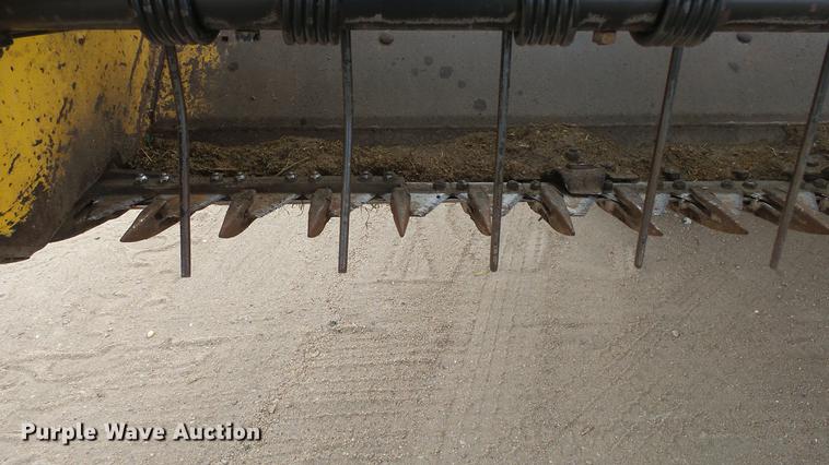 image for item DC0639 2002 New Holland HW320 Haybine self-propelled windrower