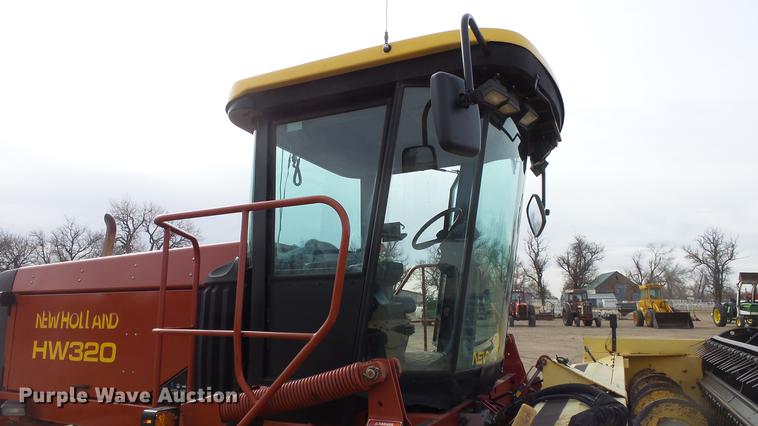 image for item DC0639 2002 New Holland HW320 Haybine self-propelled windrower