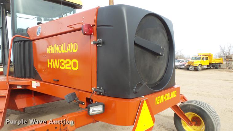 image for item DC0639 2002 New Holland HW320 Haybine self-propelled windrower