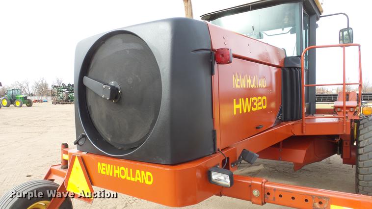 image for item DC0639 2002 New Holland HW320 Haybine self-propelled windrower