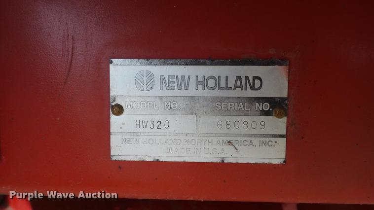 image for item DC0639 2002 New Holland HW320 Haybine self-propelled windrower