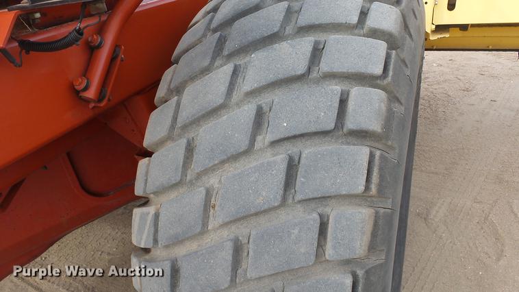 image for item DC0639 2002 New Holland HW320 Haybine self-propelled windrower