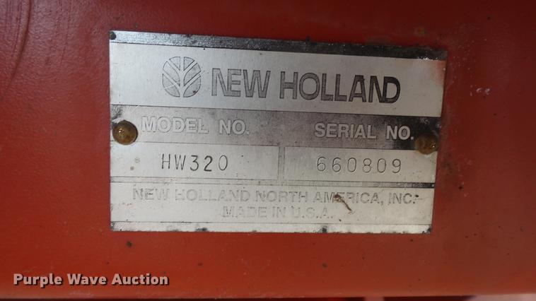 image for item DC0639 2002 New Holland HW320 Haybine self-propelled windrower