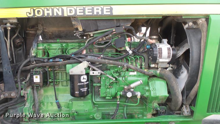 image for item DC0642 1997 John Deere 7710 MFWD tractor