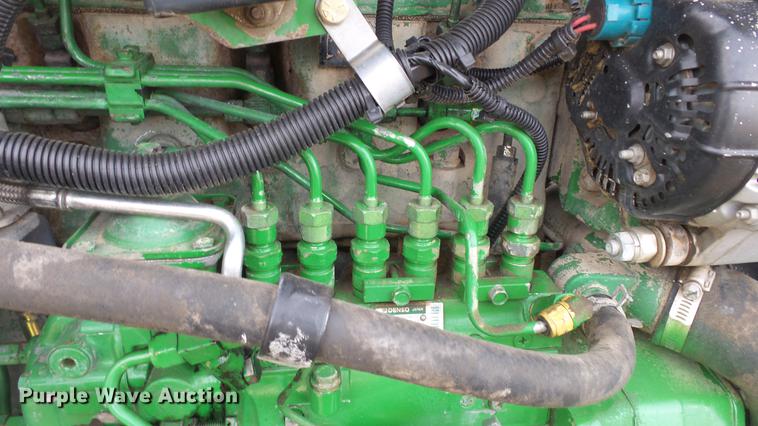 image for item DC0642 1997 John Deere 7710 MFWD tractor