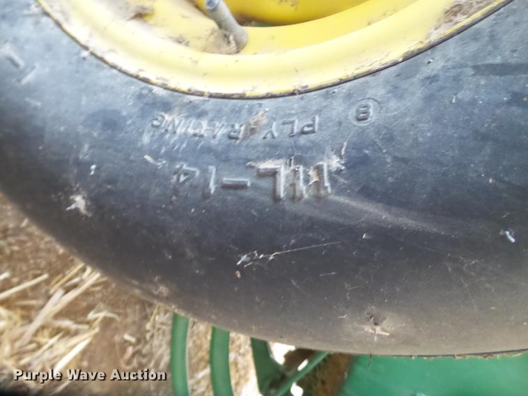 image for item DD1242 1999 John Deere 348W square baler