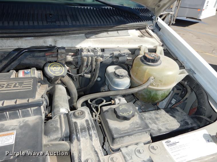 image for item DC0295 2000 Ford Econoline E350 Super Duty Goshen Coach shuttle bus