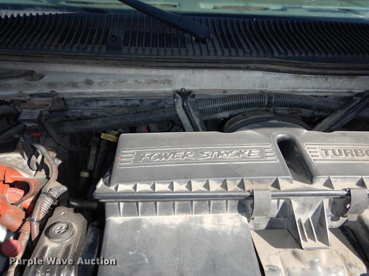 image for item DC0295 2000 Ford Econoline E350 Super Duty Goshen Coach shuttle bus