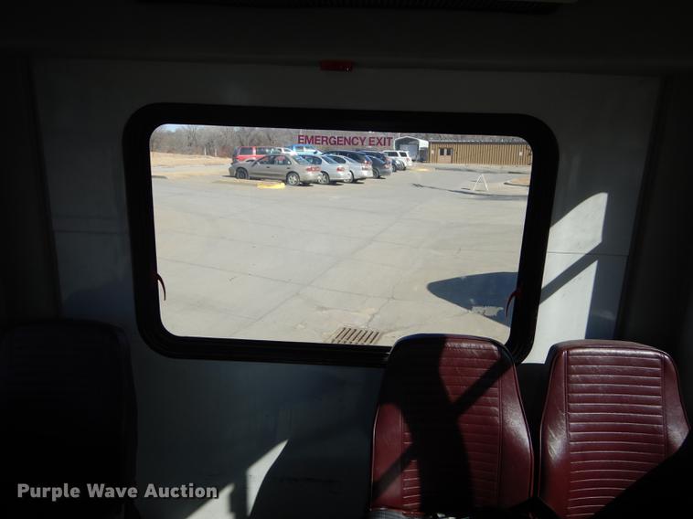 image for item DC0295 2000 Ford Econoline E350 Super Duty Goshen Coach shuttle bus