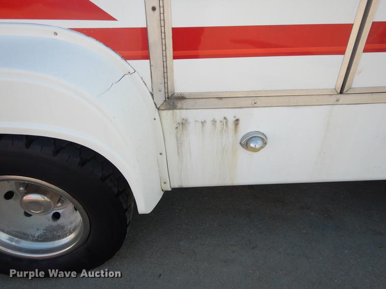 image for item DC0295 2000 Ford Econoline E350 Super Duty Goshen Coach shuttle bus