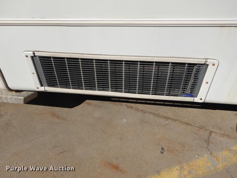 image for item DC0295 2000 Ford Econoline E350 Super Duty Goshen Coach shuttle bus